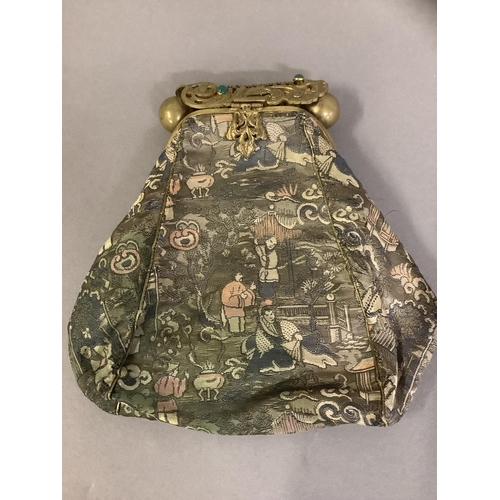 235 - Two early 20th century lamé evening bags, the first with elaborate metal frame inset with stones, ch... 