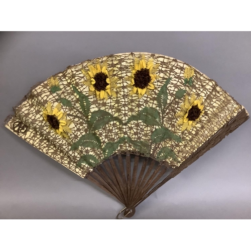 71 - Ann Collier: Sunflowers, a large lace fan mounted on late 19th century carved and pierced wood stick... 