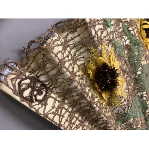 71 - Ann Collier: Sunflowers, a large lace fan mounted on late 19th century carved and pierced wood stick... 