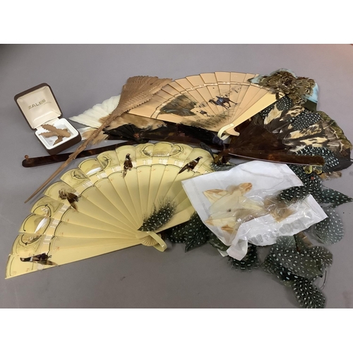 86 - A selection of Marquetry feather fans plus another: two marquetry feather fans, both on faux tortois... 