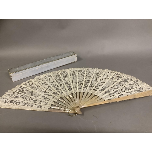 53 - Antique Lace: a c 1890’s Mixed Brussels lace fan, the monture of pink mother of pearl, the deep leaf... 