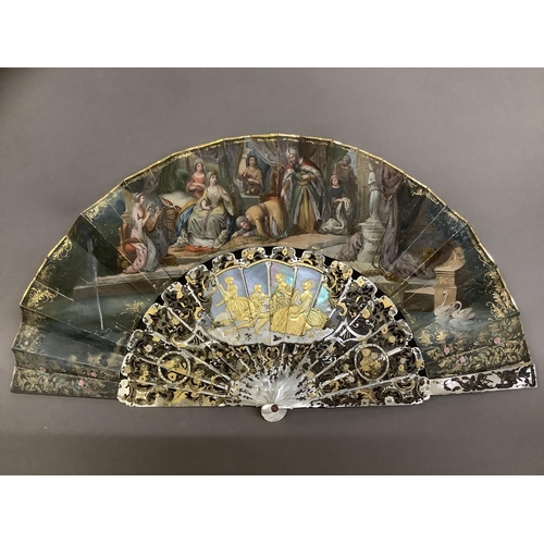 13 - C 1860/70’s, a good mother of pearl fan with extensive gilding, deep gorge and well carved sticks, t... 