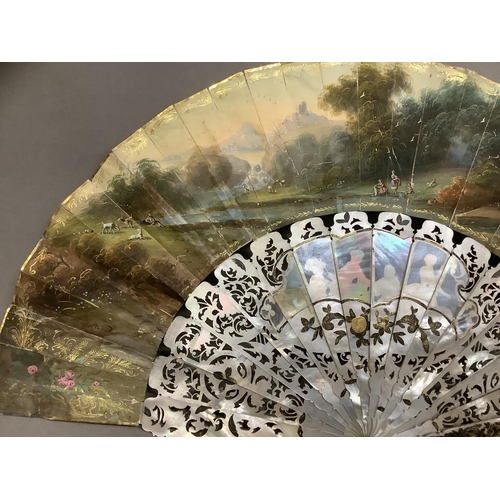 13 - C 1860/70’s, a good mother of pearl fan with extensive gilding, deep gorge and well carved sticks, t... 