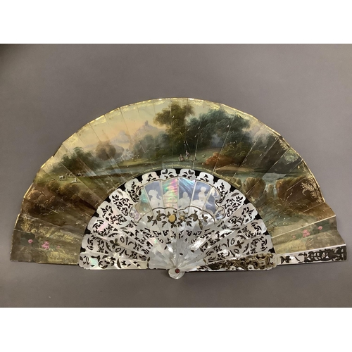 13 - C 1860/70’s, a good mother of pearl fan with extensive gilding, deep gorge and well carved sticks, t... 