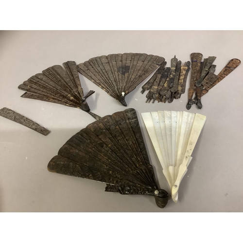 139 - C 1840’s, Chinese mother of pearl and tortoiseshell: a Chinese mother of pearl brisé fan, the wedge ... 