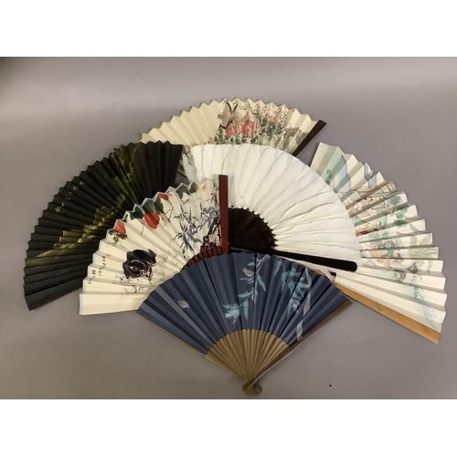 138 - Chinese fans, six, the first featuring a lady at rest in the garden, receiving visitors, the double ... 