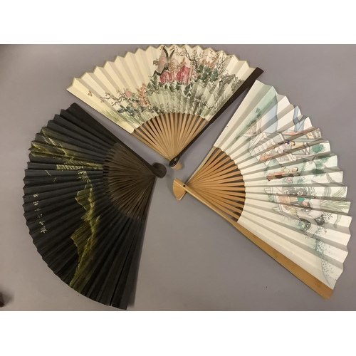 138 - Chinese fans, six, the first featuring a lady at rest in the garden, receiving visitors, the double ... 