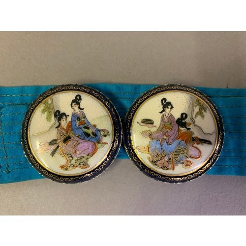 150 - An early 20th Century Japanese belt buckle, an exquisite example of hand painted enamel and gilded p... 