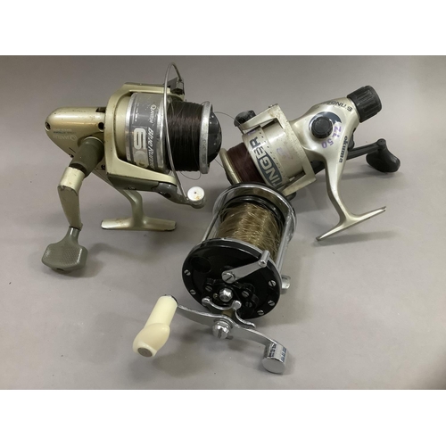 262 - Three Saltwater fishing reels to include Quantum Blue Runner, Stinger ZL50 and one other unnamed (3)