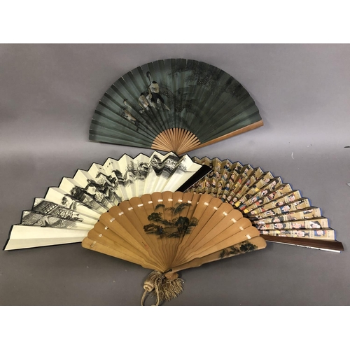 119 - Four oriental fans: a 19th century Japanese wood brisé the 18 inner sticks and two guards with round... 