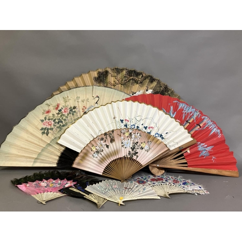 131 - Oriental fans: A selection of folding fans to include 3 Chinese feather fans mounted on pierced bone... 