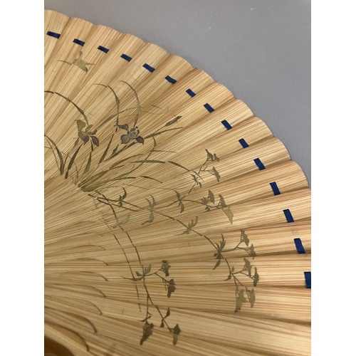 133 - Oriental fans: A detailed Chinese folding fan with double paper leaf, each side showing a topographi... 