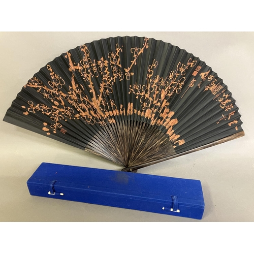 134 - An original fan by Chinese Master Artist Fu Hua, 20th century, the recto painted with flowering bush... 