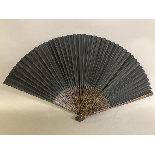 134 - An original fan by Chinese Master Artist Fu Hua, 20th century, the recto painted with flowering bush... 