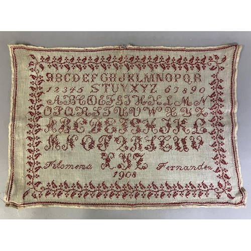 209 - An Antique European sampler dated 1908, alpha-numeric, worked in red on a fairly open weave canvas, ... 