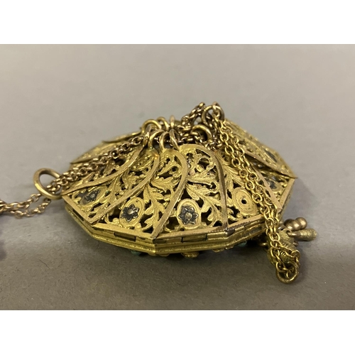 234 - A good Regency coin purse, likely 1820 – 30, gilt metal, incised, elaborate, foliate designs, delica... 