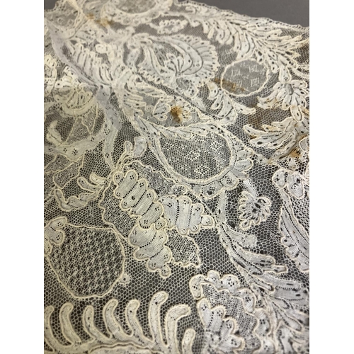 258 - Antique lace, knitting and crochet:  two lace items in the form of cap backs, with additions, the fi... 