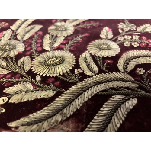 261 - Antique lace and embroidery: a velvet Panel, 19th century, most likely salvaged from a damaged retic... 