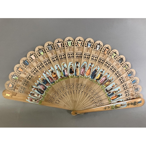 33 - A wood brisé fan of the type produced in Austria and then applied with scraps, in ascending size, ma... 