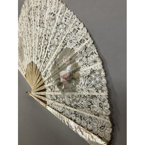 49 - A good Brussels lace fan, mounted on mother of pearl, burgau, including the ribs, the leaf most like... 