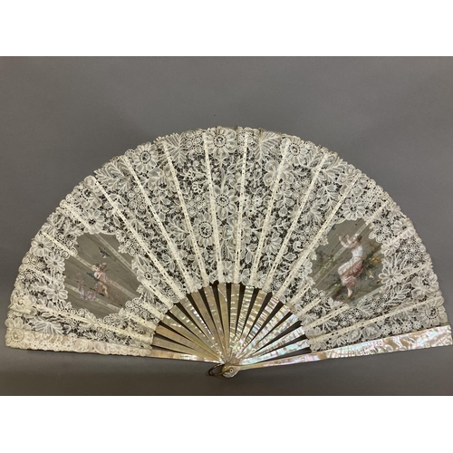 49 - A good Brussels lace fan, mounted on mother of pearl, burgau, including the ribs, the leaf most like... 