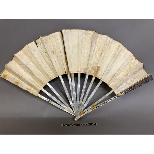 6 - A late 18th century Grand Tour fan, the monture of mother of pearl, gilded, with design to the gorge... 