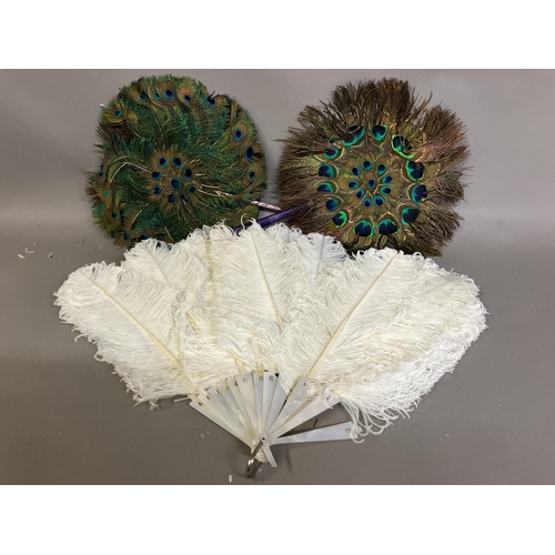 88 - A late 19th century white ostrich feather fan, the monture of white mother of pearl, plain other tha... 