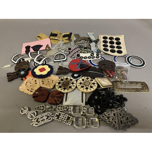 229 - 1930’s and earlier buckles, belts, hatpins, dress clips, buttons etc: comprising two diamanté belts,... 