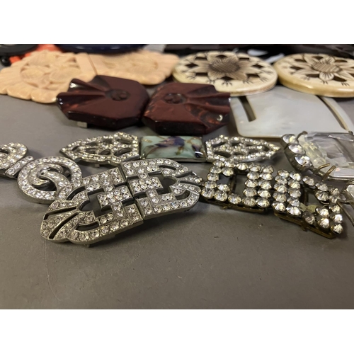 229 - 1930’s and earlier buckles, belts, hatpins, dress clips, buttons etc: comprising two diamanté belts,... 