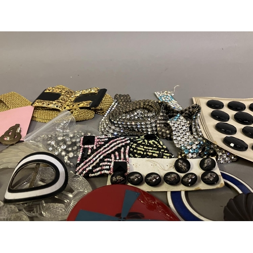 229 - 1930’s and earlier buckles, belts, hatpins, dress clips, buttons etc: comprising two diamanté belts,... 