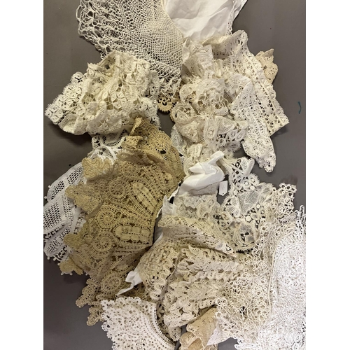 284 - A collector’s selection of bobbin, needle and knitted lace, mainly 19th century, to include Maltese,... 