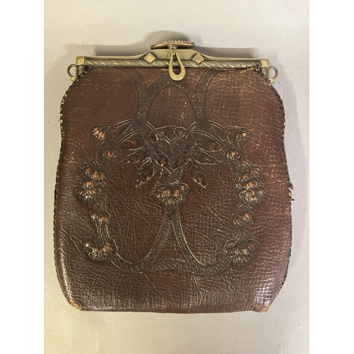 245 - A selection of 19th and 20th century bags: a good Art Nouveau leather bag, embossed on the front pan... 