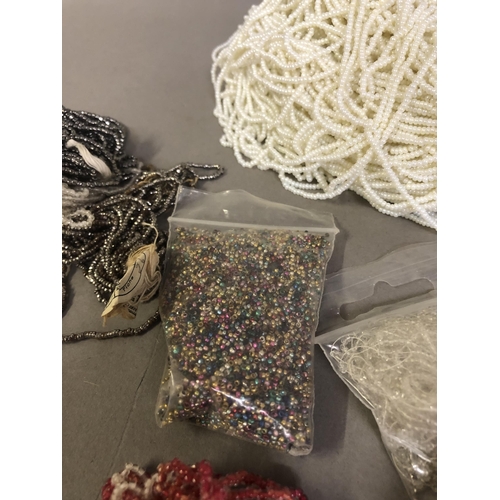 246 - Skeins of 1920’s original bugle and other beads for restoration, including approximately 990 grams o... 