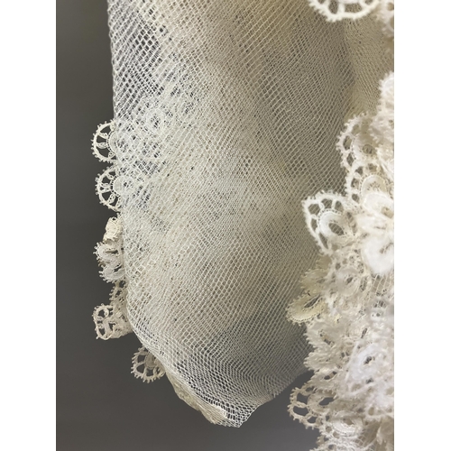 278 - Antique Lace: a good Honiton appliqué wedding veil, with scalloped border, and large floral sprays i... 