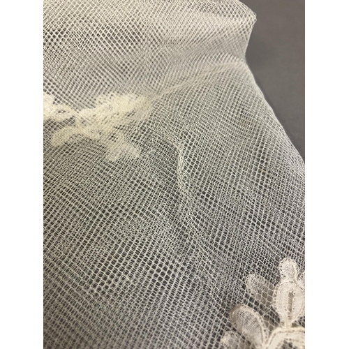 278 - Antique Lace: a good Honiton appliqué wedding veil, with scalloped border, and large floral sprays i... 