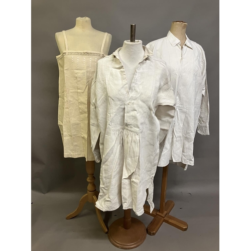 304 - Two mid-19th century rustic gentlemen’s shirts, both heavy linen, from a farming family, with droppe... 