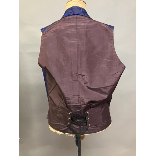 307 - A good Victorian gentleman’s woven silk waistcoat, a soft plum woven with a floral design in navy bl... 