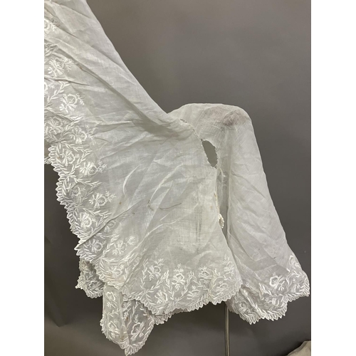 308 - Antique lace: a bonnet veil in cream embroidered net, foliate design; two other hat veils in net, on... 