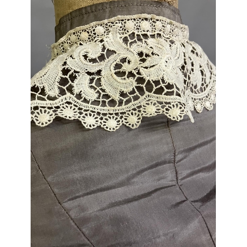 331 - A c 1880’s two piece light grey silk ensemble, the long-line bodice tailored and shaped at the back ... 