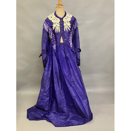 341 - A bold purple silk taffeta two-piece c 1865 -70, the boned bodice with bell sleeves, embossed metal ... 