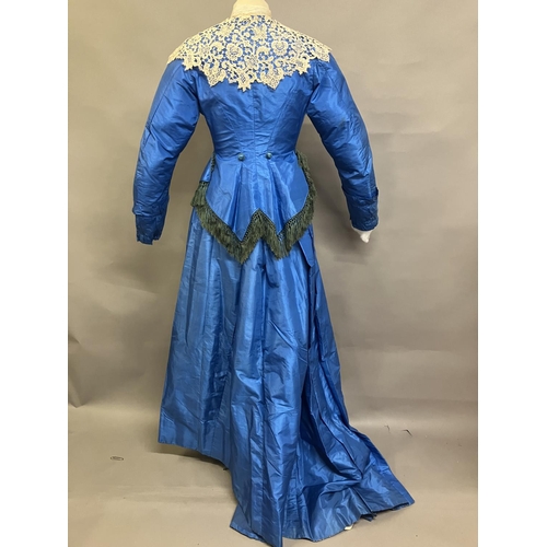 347 - A sky-blue light weight silk two piece ensemble c 1880’s, the tailored long-line bodice with covered... 