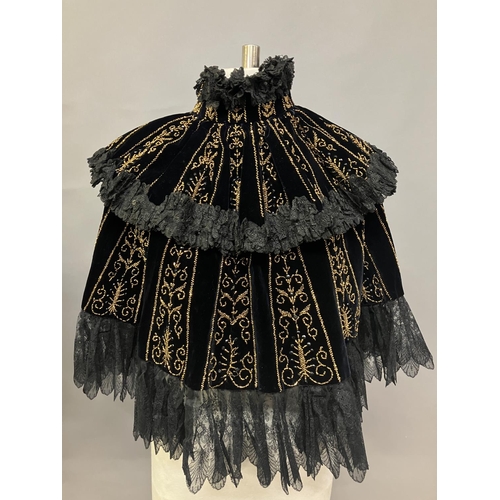 359 - An elaborately beaded Victorian beaded mantle, elbow length, black velvet formed in 2 layers, each t... 