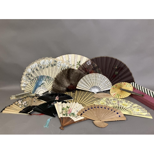 9 - Five c 1890’s fans plus an assortment of tourist and other fans: a large bone fan, the leaf a good h... 