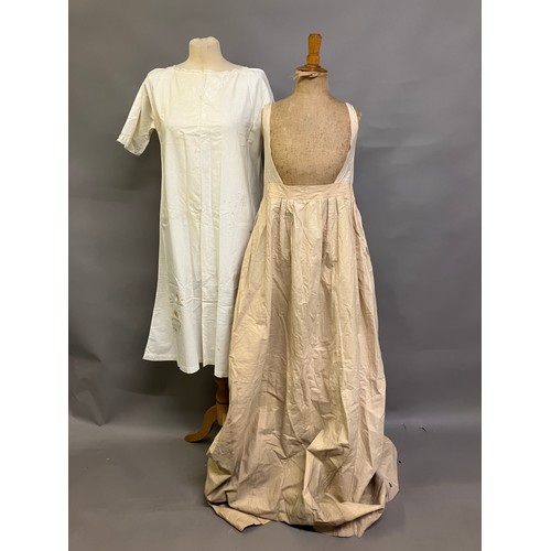 308B - A full-length lady’s undergarment, a long beige linen skirt with a cotton bodice attached, perhaps 1... 