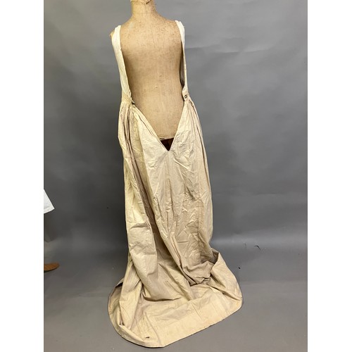 308B - A full-length lady’s undergarment, a long beige linen skirt with a cotton bodice attached, perhaps 1... 