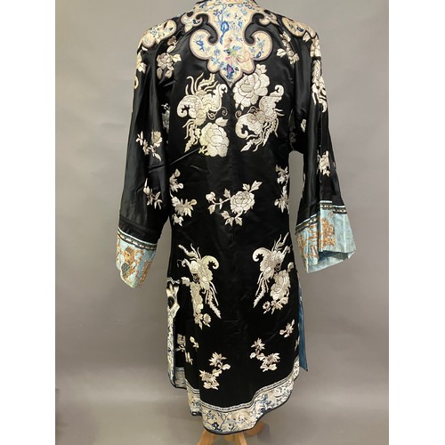 141 - A late 19th c/early 20th century Chinese silk robe, black with applied shaped cloud collar, embroide... 