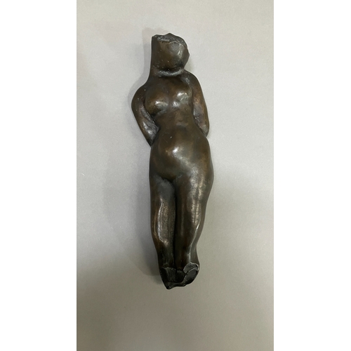 11 - British School mid 20th century, A bronze female nude figure, reclining, 22cm long