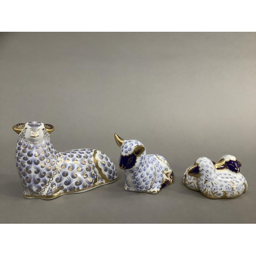 13 - A Royal Crown Derby ram, ewe and two lambs, silver buttons (3) 7.5cm, 6.5cm and 4 cm high