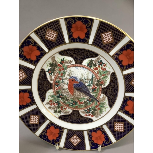 27 - Three Royal Crown Derby Christmas plates, 1992 No: 213/ 2000, decorated with a partridge in a pear t... 