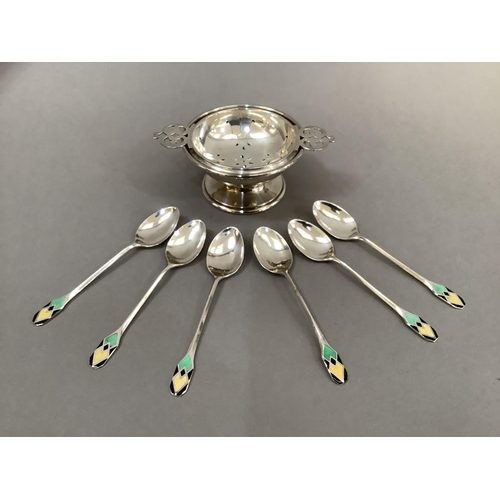 377 - Silver tea strainer and dish stand, Birmingham 1926, 2oz, a set of six silver and enamelled coffee s... 